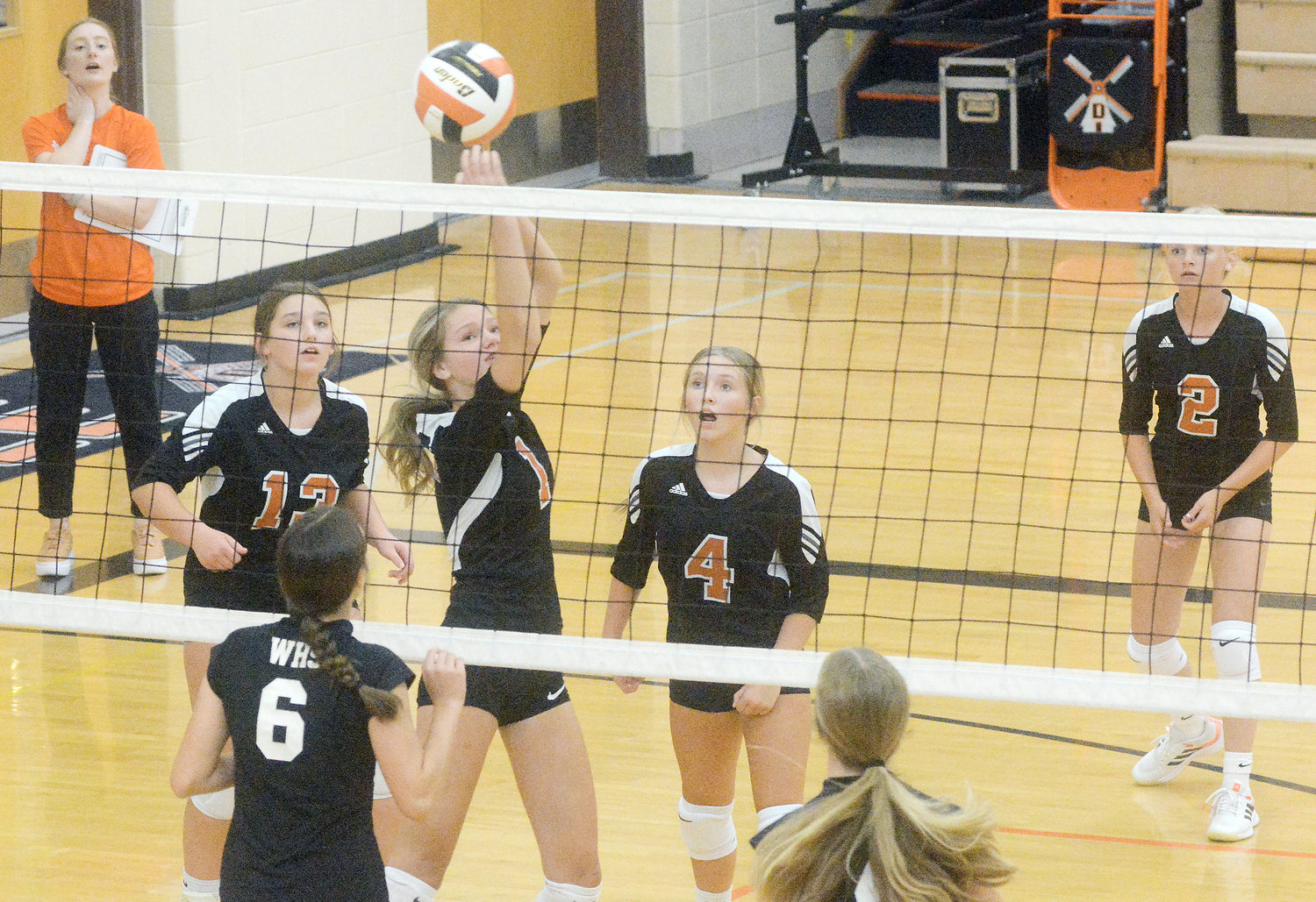 Rachel Koepke (second from left) sends the ball back over the net during freshman volleyball action last Wednesday night at Owensville High School between the Dutchgirls and Washington’s Lady Blue Jays.